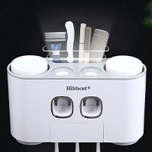 toothpaste dispenser and toothbrush holder