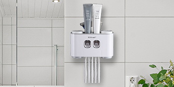 toothpaste dispenser and toothbrush holder